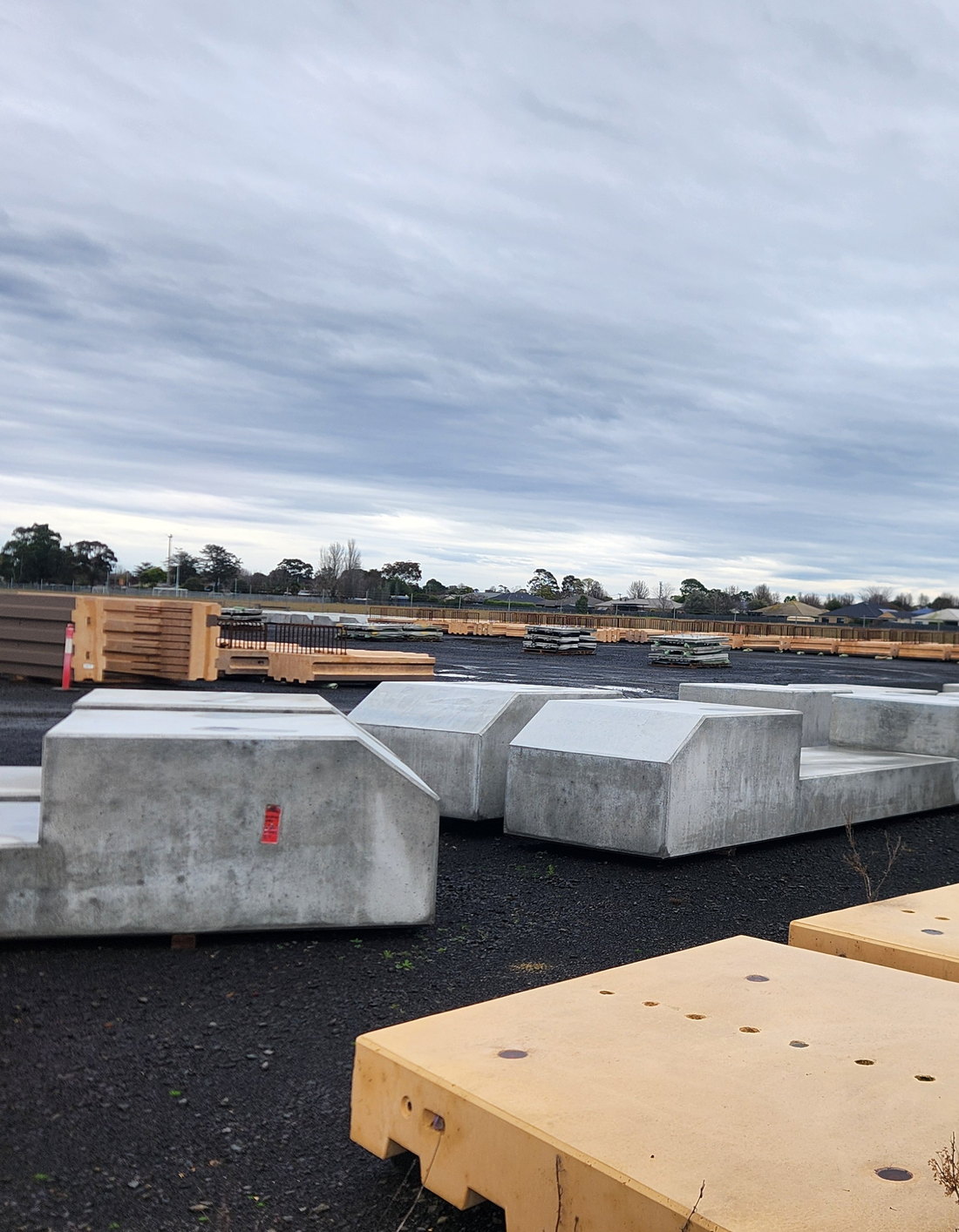 Switchgear and control equipment installed against a precast wall on site