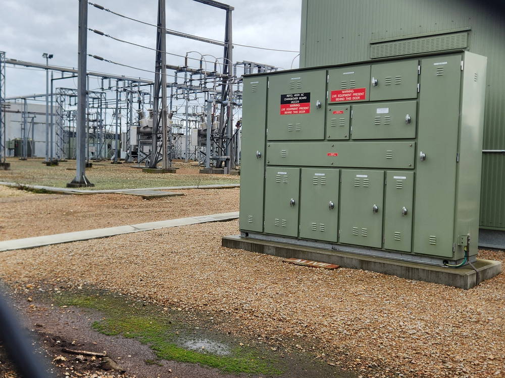 Switchgear cabinet in front of a substation compound