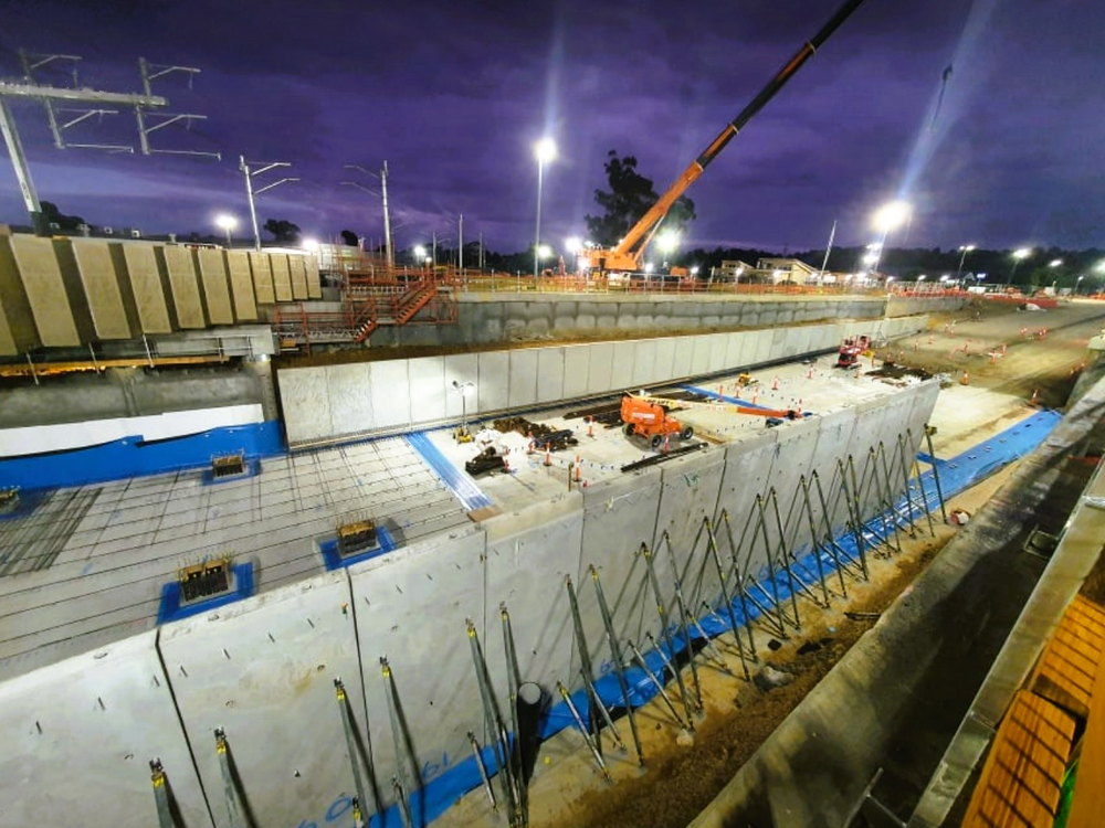 Reinforced concrete cutting under construction at night