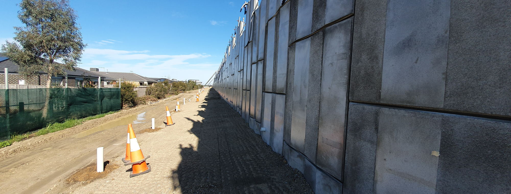Precast concrete panels installed along a road corridor
